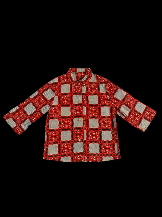Red and white checkered pattern on a white fabric background