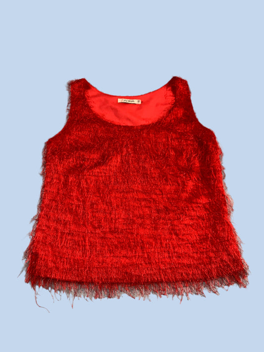 Red sleeveless top on a gray background