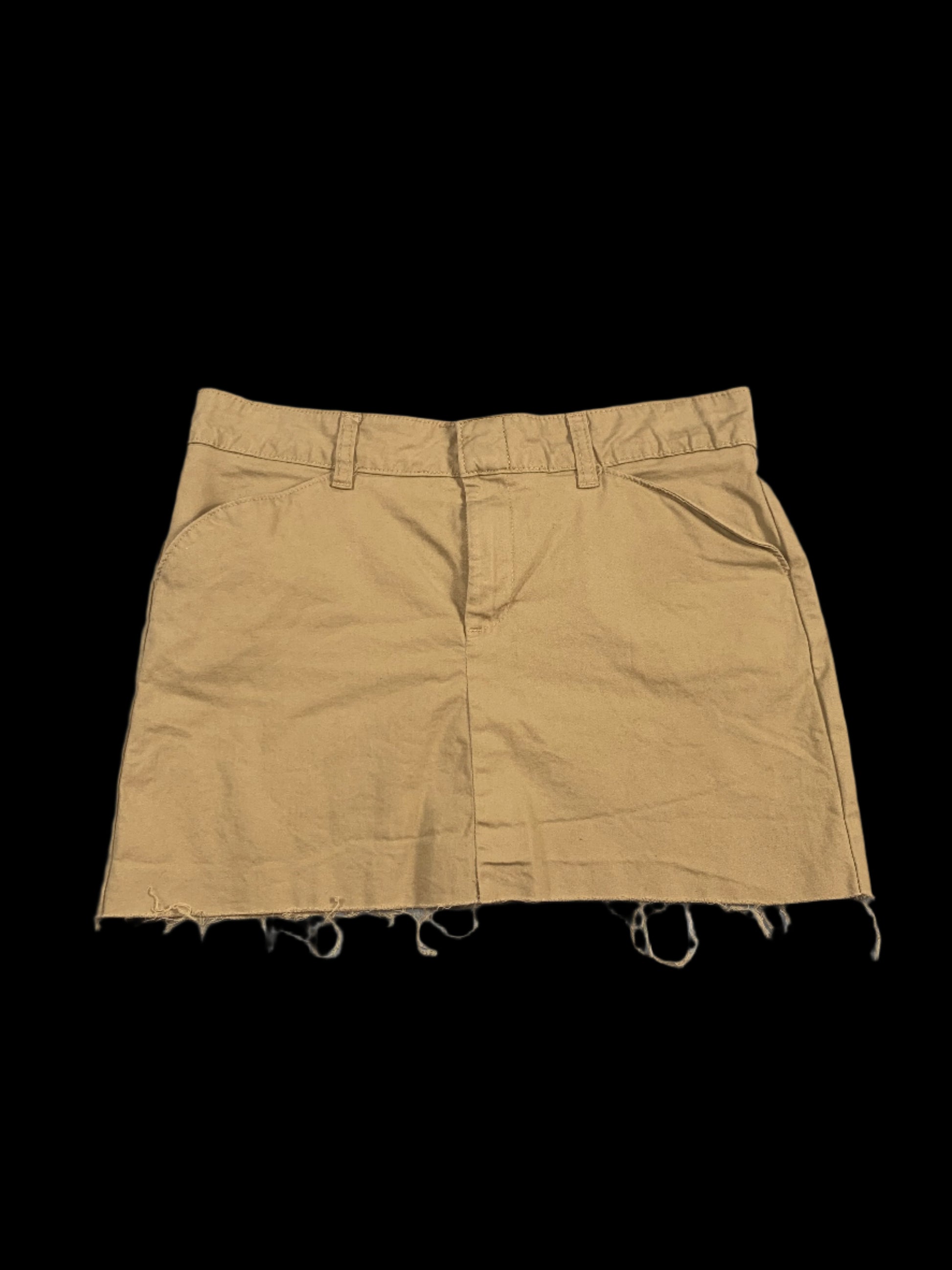 Beige shorts on a light gray background